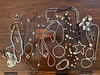 Full layout of all necklaces, bracelets and earrings