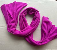 Full view of hot pink cashmere wrap laid out