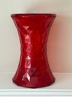 Full view of red faceted acrylic stool