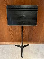 Full view of Manhasset music stand showing tripod base and adjustable shaft