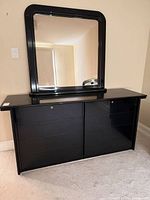 Front view of dresser with attached mirror