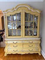 Full view of Drexel French provincial china cabinet showing upper glass door section and lower drawer section