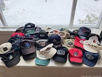 All 37 caps laid out on table