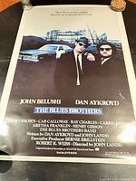 Full view of The Blues Brothers poster showing artwork, title and credits