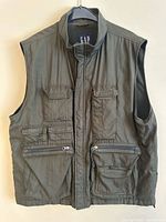 Front view showing pockets, zipper and Velcro flap