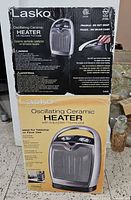 Front of two-piece retail box showing heater image and branding