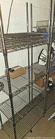 Full view of chrome wire shelving showing multiple shelves and accessories