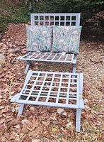 Chair with ottoman and 2 pillows