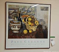 framed Cézanne museum print hanging on wall