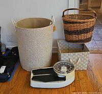 All four items together: scale, cloth hamper, wicker basket, woven tote