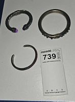 All three bracelets laid out for scale reference