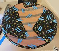 Top view of painted terracotta bowl showing abstract pattern