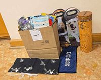 All items together including paper bag filled with gift bags, fabric sleeves in front