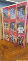 Binder pages showing red-border 1992 Leaf Triple Play baseball cards