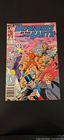 Front cover of Defenders of the Earth #2 comic on black background