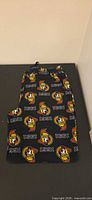 Folded Ottawa Senators lounge pants showing logo pattern