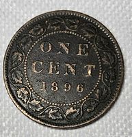 Reverse of 1896 Canadian one cent showing denomination, date and maple leaf wreath