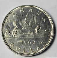 Reverse of 1968 Canadian dollar showing canoe design and date