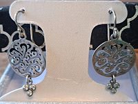 Front view of earrings on display card
