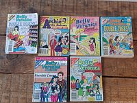 Six digest-format comics laid out; provides overview of all items