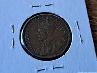Obverse of 1916 Canadian one cent showing King George V portrait in holder