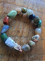 Entire bracelet laid flat showing variety of gemstone beads