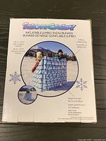 Front of retail box showing SnowCandy inflatable jumbo snow bunker