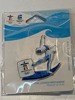 Front view of sealed Vancouver 2010 figure skating enamel pin on card