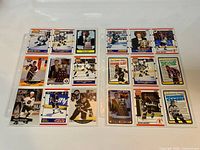 Both nine-pocket pages showing all 18 cards