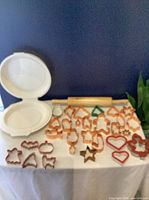 Overall lot showing pie keeper, rolling pin and multiple cookie cutters