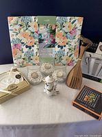 Group view showing placemats packaging, candle holders, nightlight, spatula, boxed dipping plate