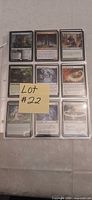 Nine Magic: The Gathering cards in a single binder sleeve page