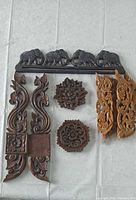 All wooden moldings laid out showing shapes and colors