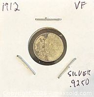 Front of 1912 Canada 5 cents coin in holder