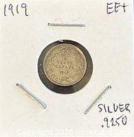 Coin in protective 2x2 holder labeled silver .9250 and EF+