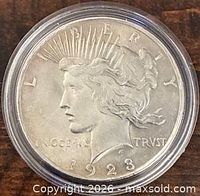 Obverse of 1923 Peace Dollar in capsule