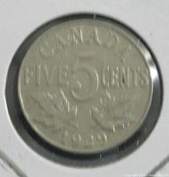 Reverse side showing date 1929, denomination 5 CENTS, maple leaves