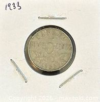 Reverse of 1933 Canadian 5-cent coin in holder