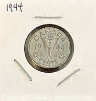 Front of coin showing reverse design with V and torch, date 1944