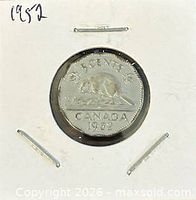 Reverse of 1952 Canadian 5-cent coin showing beaver design and date