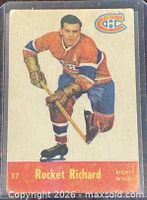 Front of 1955-56 Parkhurst card #37 showing Maurice “Rocket” Richard in Canadiens uniform, card in protective sleeve
