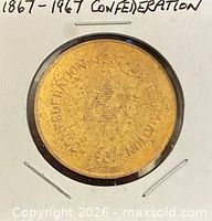 Obverse of brass 1867-1967 Confederation medal in holder