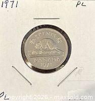Reverse side showing beaver design and 5 cents denomination