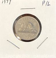 Full view of 1977 Canadian 5-cent coin reverse in holder