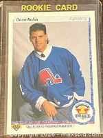 Front of Owen Nolan Upper Deck rookie card in holder