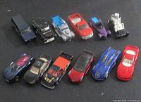 Group shot of all 12 die-cast vehicles