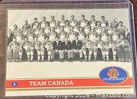 Front of roster photo trading card showing Team Canada and card number 8