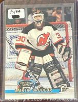 Front of 1993-94 Topps Stadium Club Martin Brodeur card showing action photo and card number label