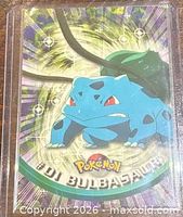 Front of Topps Pokémon Bulbasaur card in sleeve