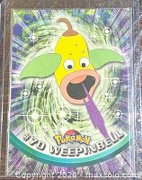 front of Topps Pokémon card #70 Weepinbell